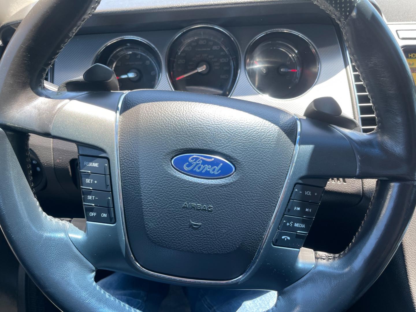 2010 White /Black Ford Taurus SHO (1FAHP2KT3AG) with an 3.5L V6 DOHC 24V TWIN TURBO engine, 6-Speed Automatic transmission, located at 11115 Chardon Rd. , Chardon, OH, 44024, (440) 214-9705, 41.580246, -81.241943 - This 2010 Ford Taurus SHO AWD is a high-performance variant of the Taurus sedan, powered by a potent 3.5L EcoBoost V6 engine that produces 365 hp and enables a 0-60 mph time of 5.2 seconds. It features an advanced AWD system, a 6-speed automatic transmission, and the SHO Performance Package. Notable - Photo#24